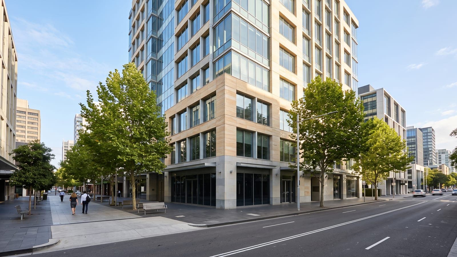 Modern office building at street level on a sunny morning